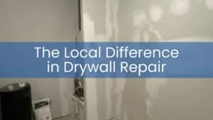 A room undergoing extensive drywall repair with fresh joint compound applied to the walls and seams.